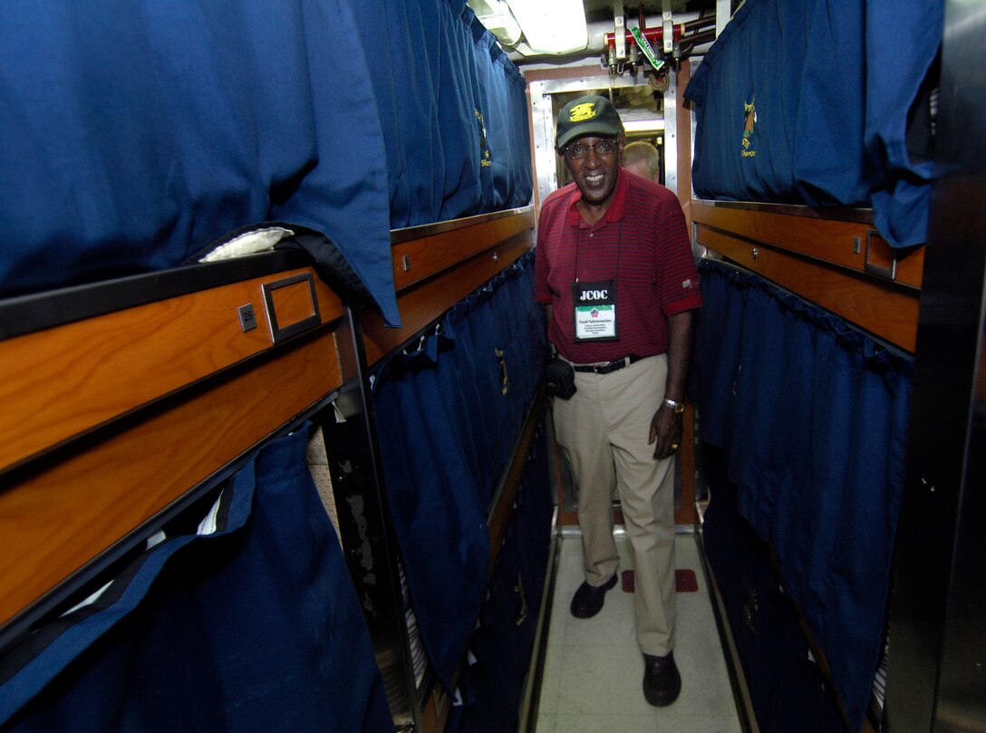 Mr. Fassil Gabremariam, president and founder of the U.S.-Africa Free Enterprise Education Foundation, Tampa, Fls., tours the berthing area of the USNS Buffalo attack-submarine while docked at U.S. Naval Base Guam during the 74th Joint Civilian Orientation Conference, Nov. 7, 2007. 