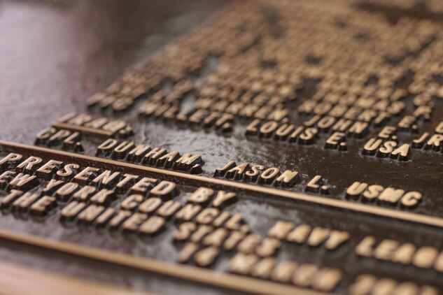 A bronze plaque listing New York state recipients of the Congressional Medal of Honor, the nation's highest military award for valor, is unveiled today in Times Square during a ceremony commemorating the latest name added to the plaque: Marine Cpl. Jason Dunham. The ceremony was held on the Marine Corps' 232nd birthday, which is also Dunham's birthday.