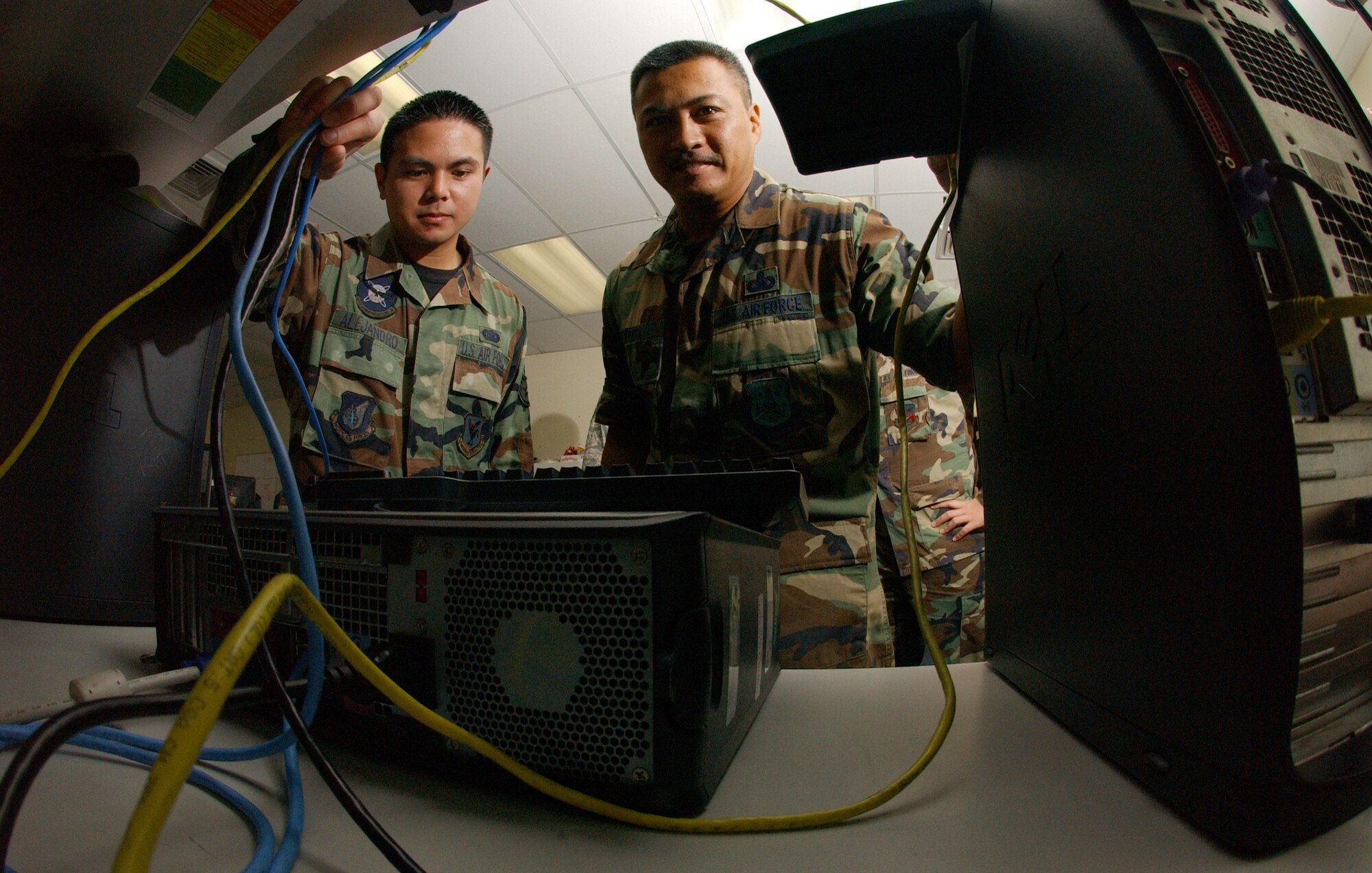 Senior Master Sgt. Vincent Devera, chief of the local network control center and originally from Guam, deployed here as an Air Force active guard reservist. Sergeant DeVera was responsible for bringing a team together, which deployed here from various organizations and fusing them into one cohesive unit of Airmen that could defend Andersen’s mission critical network from cyber intruders.  (Air Force photo/Senior Airman Brian Kimball)