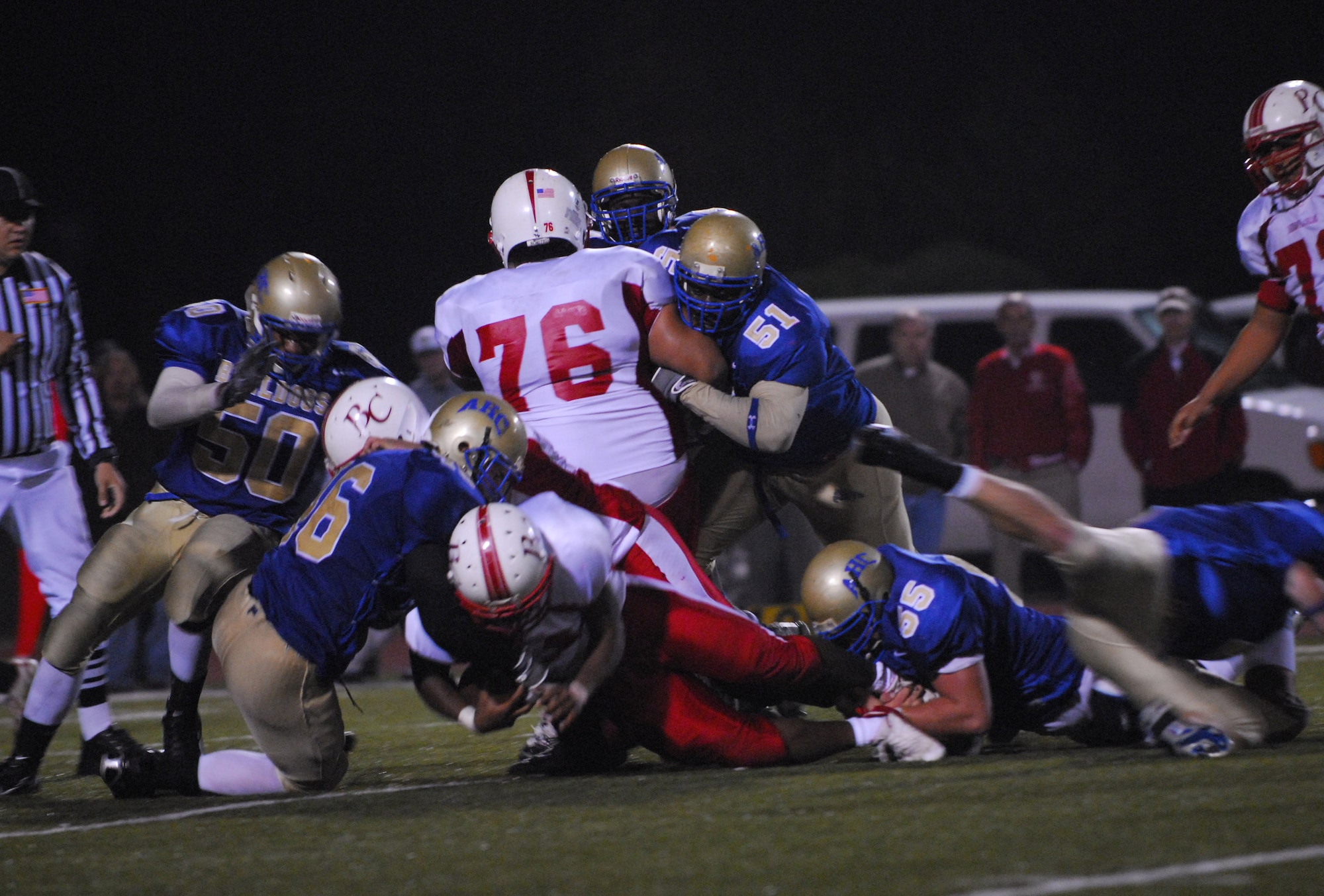 SANTA MARIA, Calif. -- Bakersfield Renegades tackle an Allan Hancock Bulldog during the 5th annual military appreciation night on Nov. 3. The Bulldogs lost 23-36. The event is held to support military members . The first 250 military members, veterans and their families were admitted at no charge and served a free tri-tip dinner. The Santa Maria Valley Chamber of Commerce, Coast Hills Federal Credit Union, and Allan Hancock College sponsored the special event. (U.S. Photo/Airman First Class Ashley Tyler)