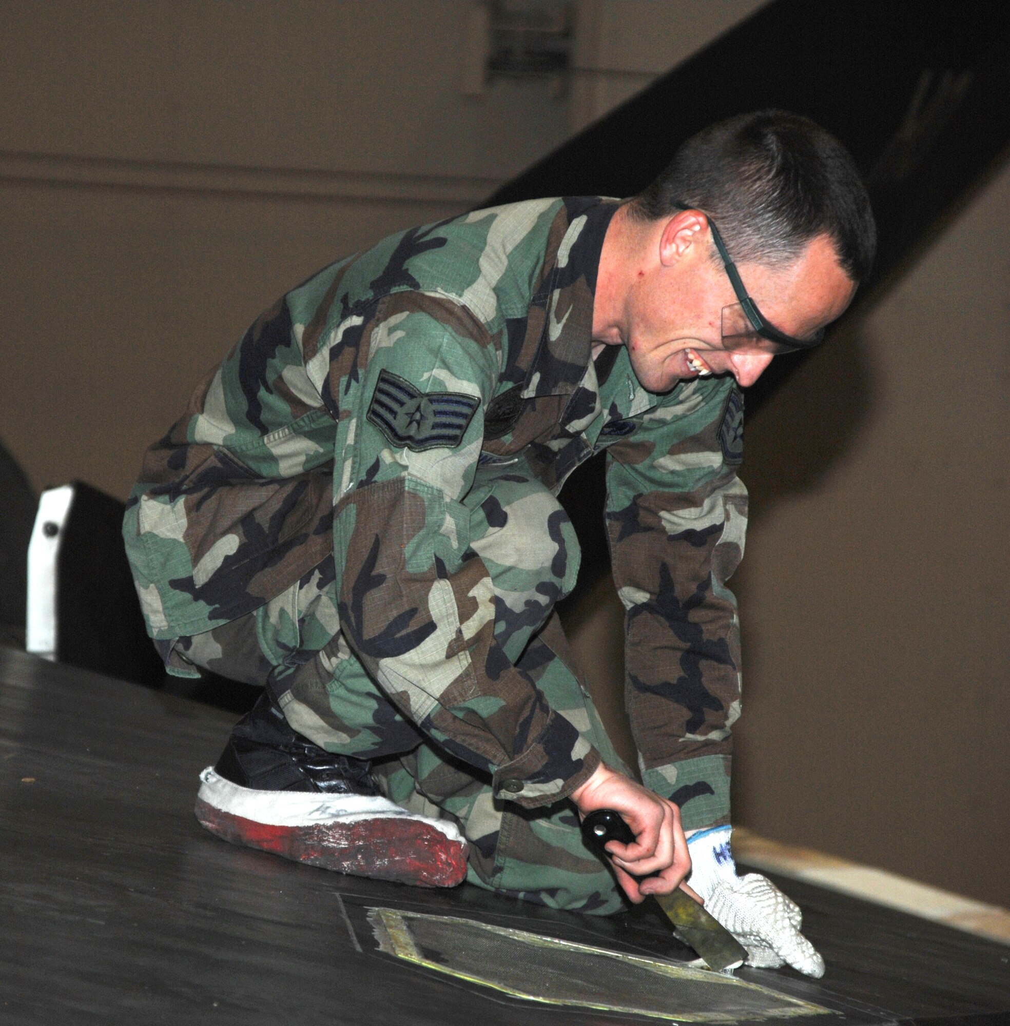 Staff Sgt. William Jenkins, 49th Aircraft Maintenance Squadron, inspects the wing of an F-117A Nighthawk during an operational readiness exercise.The players in the ORE consisted of the 49th Operations Group and 49th Maintanance Group. (U.S. Air Force photo/Airman 1st Class Tiffany Trojca)