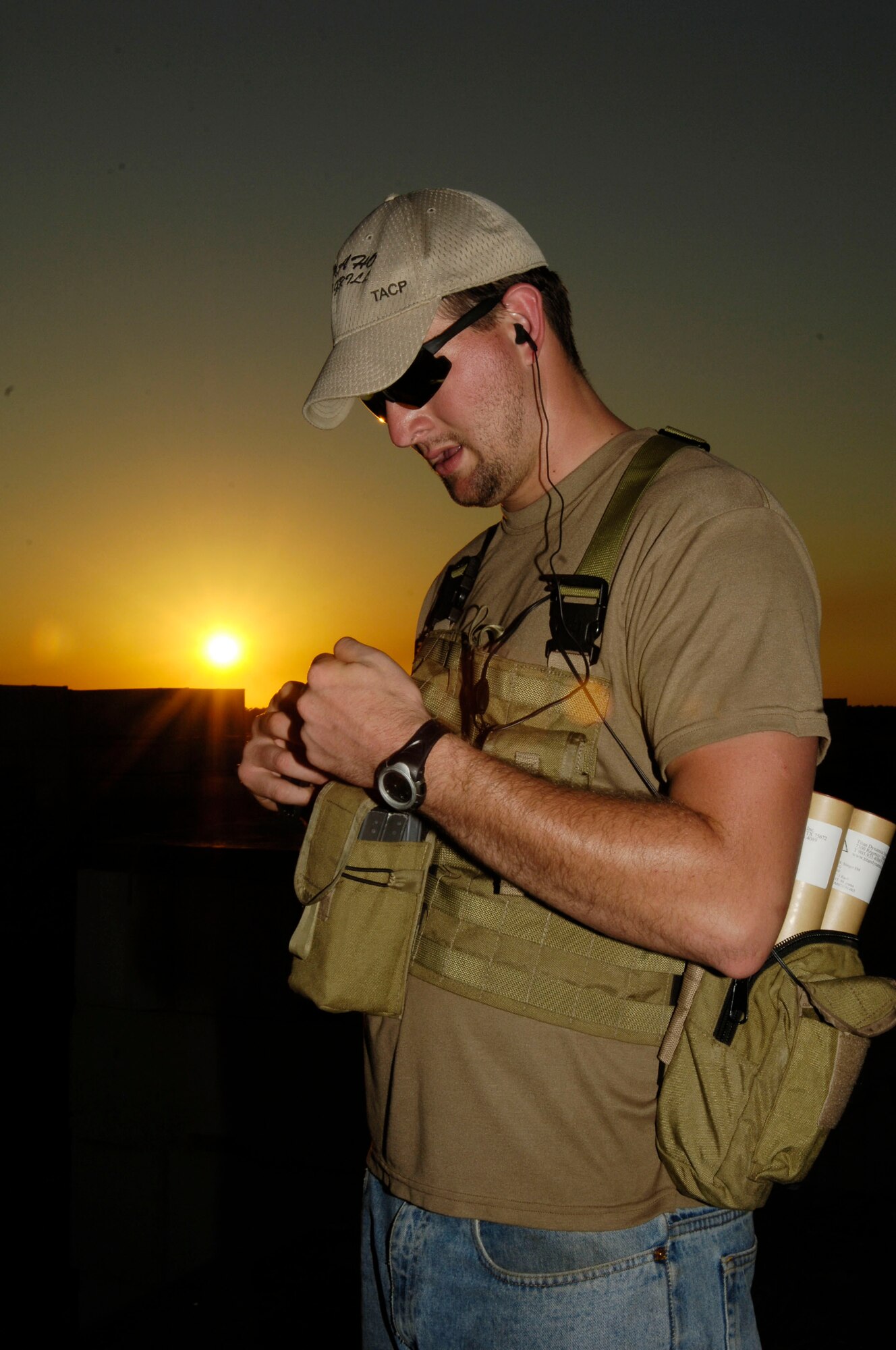 Airman 1st Class John Marcum, a Tactical Air Control Party Member with the 19th Air Support Operations Squadron at Fort Campbell, KY, prepares a flare launcher used to simulate heavy machine gun fire during Atlantic Strike VI in the Avon Park Military Training Complex in Avon Park, Fla. Airman Marcum and his team rig ground-based pyrotechnics used to add realism and feedback to aircrews and Joint Terminal Attack Controllers during urban close air support operations.
