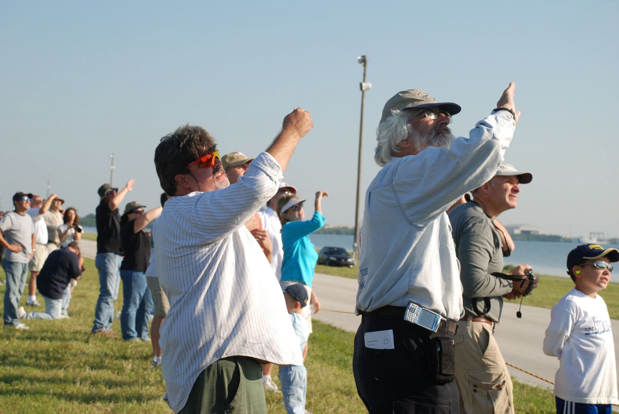 Spectators gaze skyward watching aerial deomstrations during the World Space Expo.(USAF photo by Maj. Greg Harland)