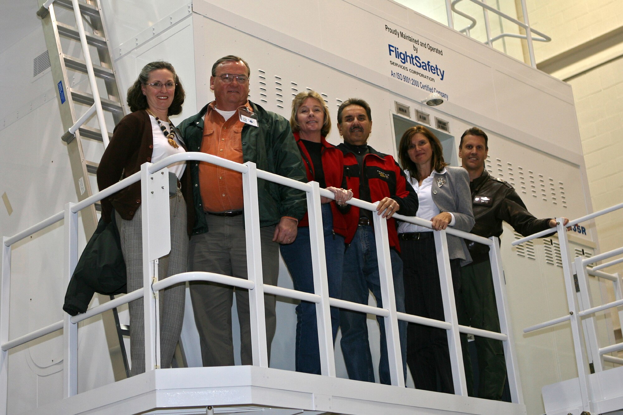 GRISSOM AIR RESERVE BASE, Ind.-- Members of the Grissom Community Council wait their turn outside the KC-135R Stratotanker full-motion simulator. Members of the GCC received a behind the scenes look at GARB and some of its training facilities. (U.S. Air Force/SrA. Omar Delacruz)