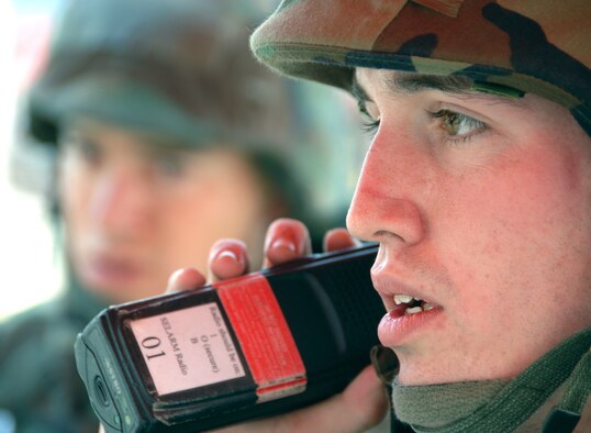 OSAN AIR BASE, Republic of Korea --  Senior Airman Jesse Staton, 51st Communications Squadron, gives his report after a simulated attack on the communications building Nov. 6.  Beverly Bulldog 08-01, a peninsula-wide operational readiness exercise, tests Team Osan's ability to defend the base and conduct daily operations in a combat environment.  (U.S. Air Force Photo by Airman First Class Chad Strohmeyer)