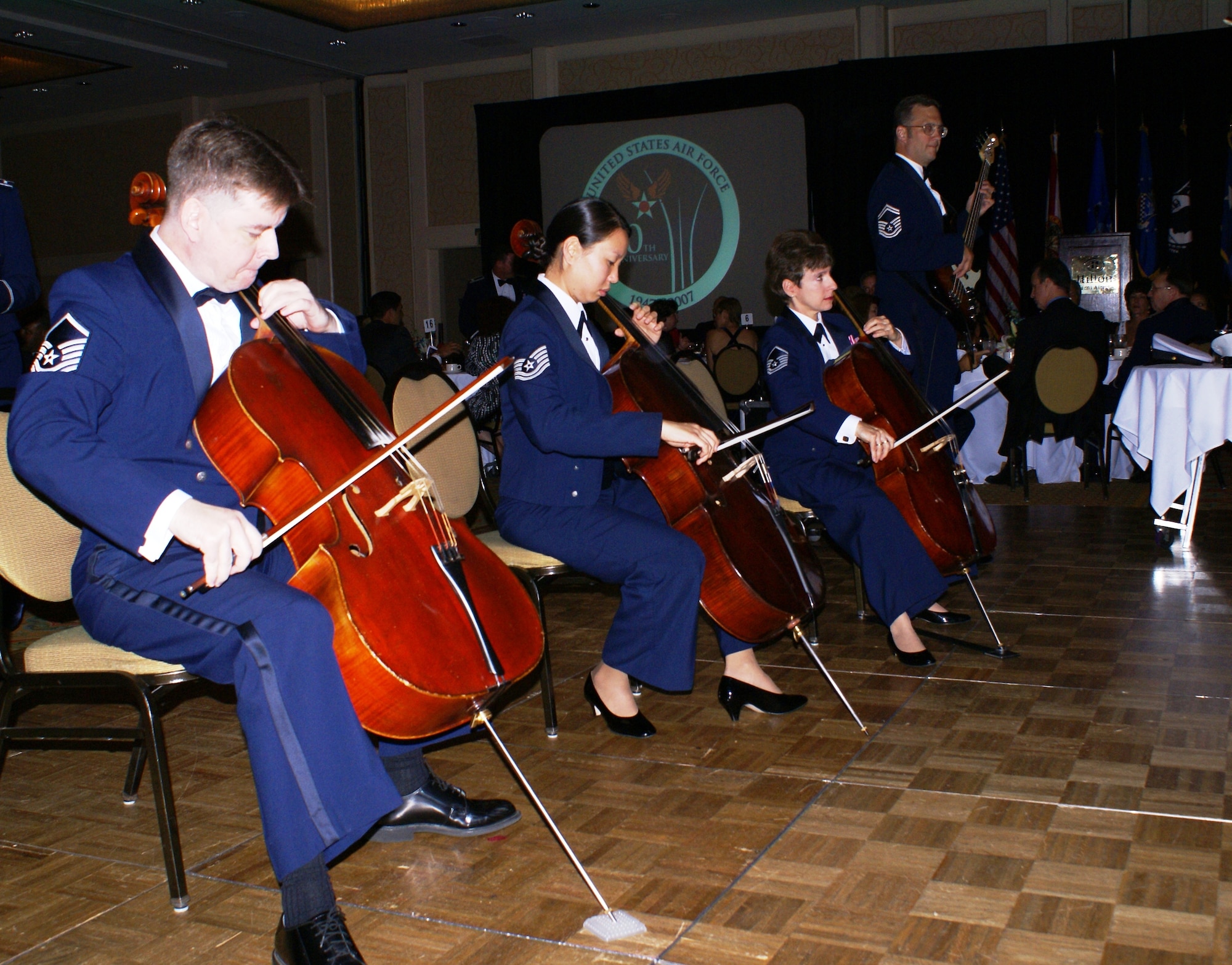 Members of The Air Force Strings entertain the 580 military and civilian personnel attending Homestead Air Reserve Base’s "Heritage to Horizons" Air Force ball, Nov. 2, 2007.  Appearing as The United States Air Force Strolling Strings since 1954, The Air Force Strings has had the honor of performing at the White House for every president from Eisenhower to Clinton.  The Air Force Strings is one of the most diverse and flexible units of The United States Air Force Band.  The night’s event was part of a year long celebration commemorating the 60th Anniversary of the U.S. Air Force and recently deployed military members. The gala was co-hosted by the 482nd Fighter Wing, Homestead ARB, Fla., and the Greater Homestead/Florida City Chamber of Commerce Military Affairs Committee. (U.S. Air Force photo/Tim Norton)