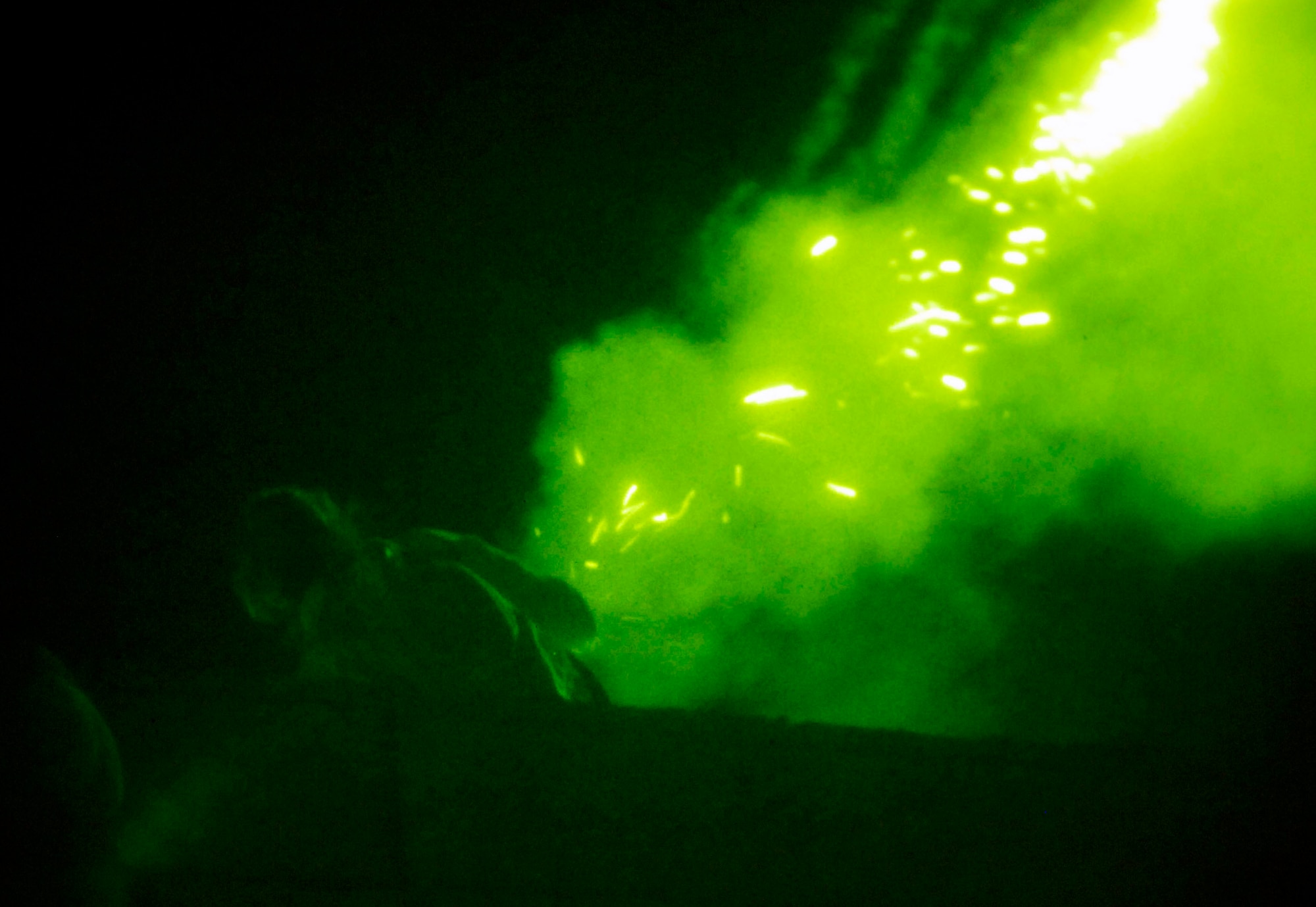 An Air Force member portraying an enemy sniper launches flares during a night engagement to simulate heavy machine gun fire as part of exercise Atlantic Strike VI Nov. 6 at Avon Park, Fla. Atlantic Strike VI is a semi-annual training event sponsored by U.S. Central Command Air Forces at the Avon Park Air Ground Training Complex. The training scenarios are aimed at preparing joint terminal attack controllers and Army joint fires observers for urban close-air-support operations prior to deployment to Iraq and Afghanistan. (U.S. Air Force photo/Airman 1st Class Stephenie Wade) 
