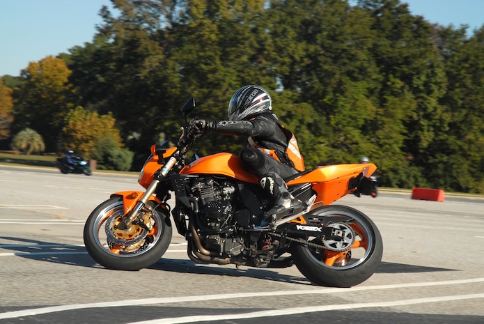 Staff Sgt. Aaron Abercrombie, 437th Aircraft Maintenance Squadron makes a turn during the sport bike riders course Nov. 9 in the Base Exchange parking lot on base. Active-duty sport bike riders will now have to successfully complete a mandatory sport bike specific training course prior to Dec. 1 to ride a sport bike on Charleston AFB.