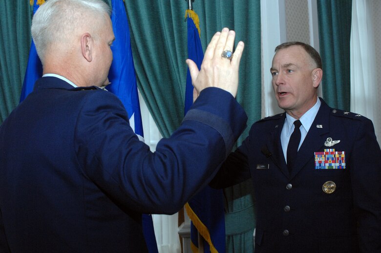 Maj. Gen. Jack Egginton, 3rd Air Force vice commander (right), affirms the oath of office administered by Lt. Gen. Robert "Rod" Bishop, 3rd Air Force commander, during General Egginton's promotion ceremony Nov. 8. (U.S. Air Force photo by Airman 1st Class Brad Smith)