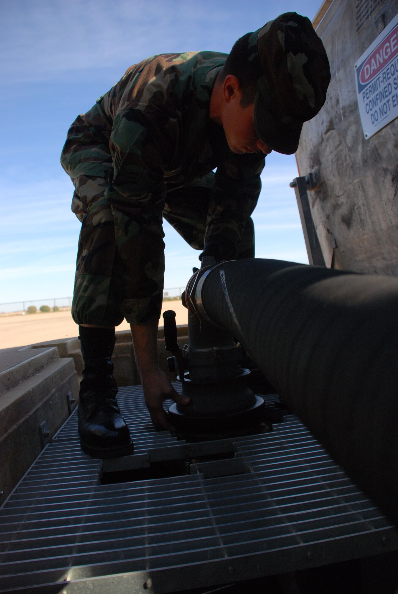 Airman  1st Class Brian Lafferty, an Airmen in Training in the fuels training course, removes a fuel hose during training Nov. 6. Airman 1st Class Hazen Sanders, recently a student in the same course and currently assigned to the 435th Logistics Readiness Squadron, Ramstein Air Force Base, Germany, recently pumped 3 million gallons of fuel in one month, setting a new Air Force record and inspiring Airmen back at Sheppard. (U.S. Air Force photo/Airman 1st Class Jacob Corbin)