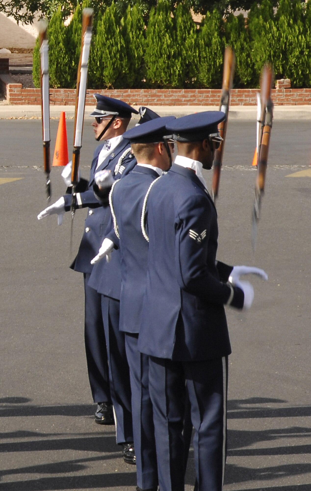 LAS VEGAS -- Members of the Air Force Honor Guard Drill Team perform at the John F. Miller School for Special Needs Nov. 8.  The drill team planned a special performance for the students at the school during their visit to Las Vegas and Nellis Air Force Base, Nev., for the final week of the Air Force's 60th Anniversary celebrations. (U.S. Air Force Photo by Airman 1st Class Alexander Montes)