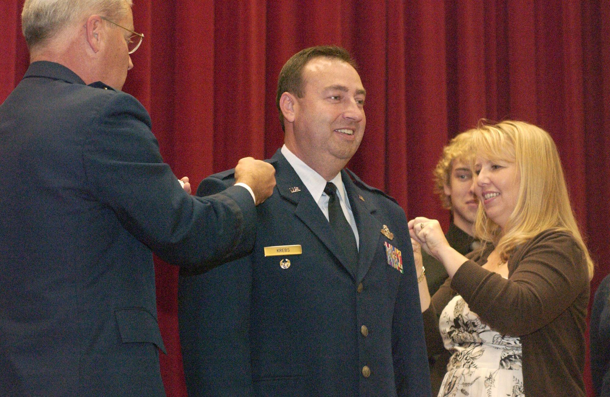 Kevin L. Krebs, the wing’s new chief of performance planning, was promoted to colonel during a ceremony Nov. 2, in the Cultural Resource Center on base. Brig Gen. James Melin, 452nd Air Mobility Wing Commander, along with Colonel Krebs’ wife, Cheryl, pinned on his rank. Two of his three children, Karl and Claire, also joined in the ceremonies. Colonel Krebs’ actual date of rank was Nov. 1 -- the same as his birthday. (U.S. Air Force photo by Amy Abbott)