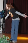 MINOT AIR FORCE BASE, N.D. -- Amber Fabian won 1st runner up in the youth singing category at the base's annual talent show, here, Nov. 8. Winners received a trophy and a base exchange gift certificate.  (Photo by Senior Airman Stacy Moless) 