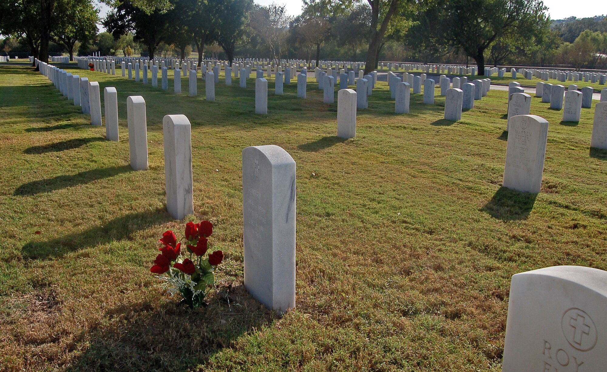 Roses adorn a gravesite at the Fort Sam Houston National Cemetery in San Antonio in honor of Veterans Day. (U.S. Air Force photo/Master Sgt. Lee Roberts)