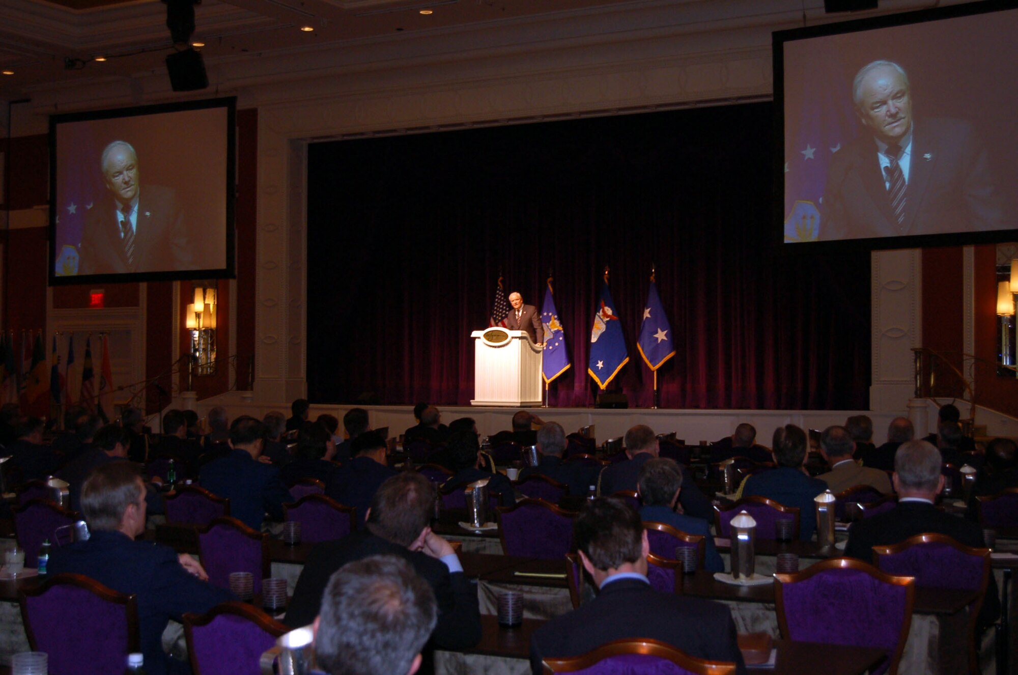Secretary of the Air Force Michael W. Wynne delivers his keynote speech to a crowd of more than 300 people during the 2007 Air and Space Leaders symposium at the Wynn Hotel and resort Nov. 8 in Las Vegas. The crowd included military members from several different nations and civilian industry leaders. The symposium was held in conjunction with the Heritage to Horizons event, which is a celebration of the Air Force's 60th anniversary. (U.S. Air Force photo/Staff Sgt. Jeremy Larlee) 
