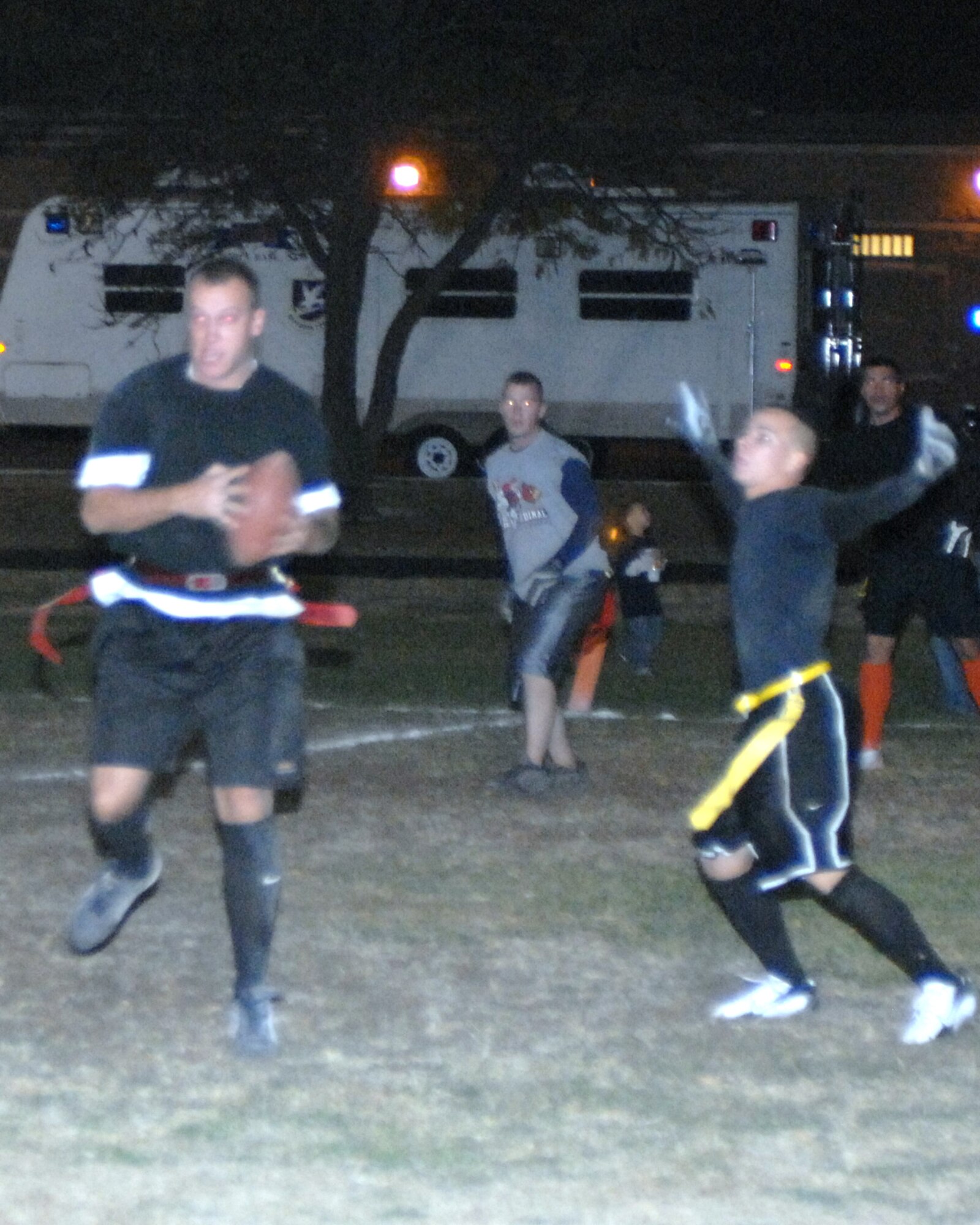 CANNON AIR FORCE BASE, N.M. -- 27th Special Operations Communications Squadron player Bryan Karason intercepts what would have been a touchdown pass for 27th Special Operations Civil Engineering Squadron during the intramural flag football championship game. SOCES won the game in overtime. (U.S. Air Force photo by Airman Elliott Sprehe)