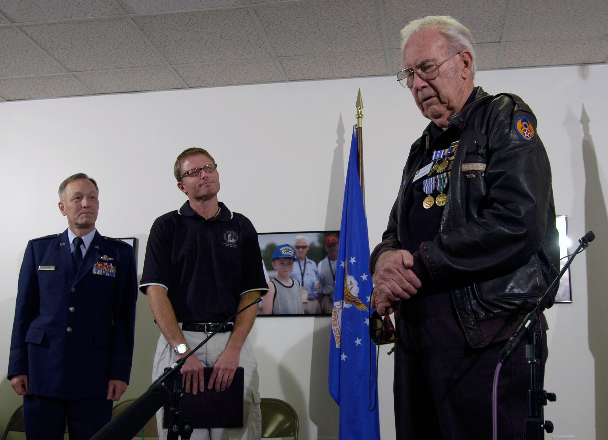 Former Staff Sgt. Elmer McGinty (right) thanks everyone who came for the decoration ceremony where he received his medals for his service during World War II. The Nov. 9 ceremony was the first time Sergeant McGinty was officially presented his medals. 