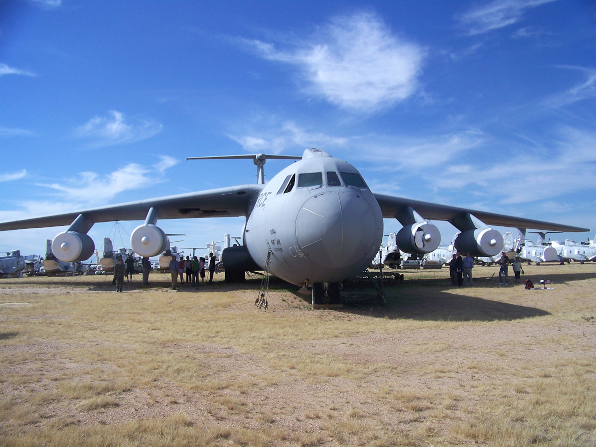 A C-141 Starlifter, the "40614", sits at Davis-Monthan's 309th Aircraft and Regeneration Center Oct. 31, during a memorial and reunion for crewmembers who nearly crashed in Richmond, Australia, on a mission to Alice Springs, Australia  30 years ago. The aircraft, which has been reclaimed for parts, is visible from the public tour bus route and will be included in AMARGs official tour script. (Desert Lightning News photo by Kristi LaBonte)
