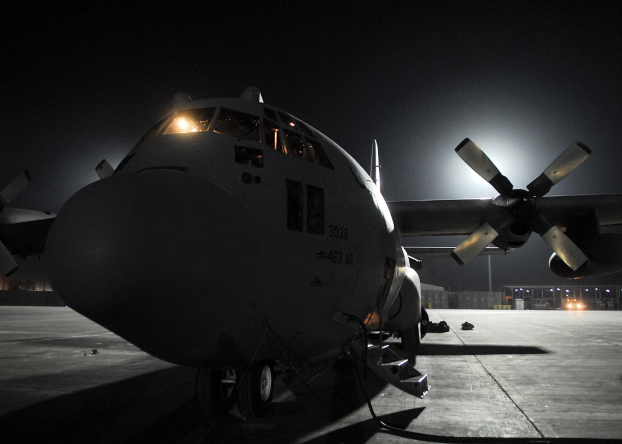 Airmen from the 777th Expeditionary Airlift Squadron at Balad Air Base, Iraq, prepare a C-130 Hercules for a mission.  Air Force transports provide intra-theater heavy airlift support, helping to sustain operations throughout Afghanistan, Iraq and the Horn of Africa.  (U.S. Air Force photo by Staff Sgt. Joshua Garcia)