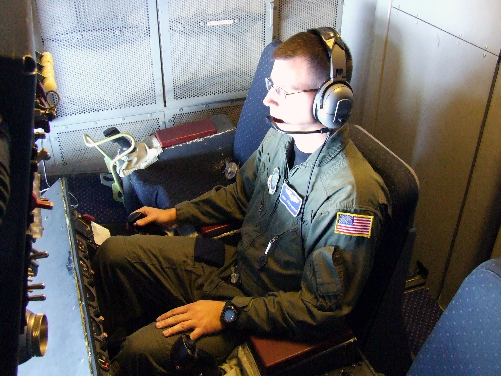 Staff Sgt. Justin Taydus, a KC-10 Extender boom operator for the 32nd Air Refueling Squadron, McGuire Air Force Base, N.J., sits at the controls of the boom pod for a KC-10 during a mission Oct. 28.  KC-10s are one of two air refueling aircraft used by the Air Force.  (U.S. Air Force Photo/Tech. Sgt. Scott T. Sturkol)