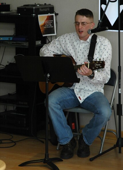 1st Lt. Grant Hosmer, 341st Missile Security Forces Squadron, plays guitar during a contemporary Christian service Nov. 4 at the Detour. The Sunday service started in October and begins at 10 a.m. (U.S. Air Force photo/Airman 1st Class Dillon White)