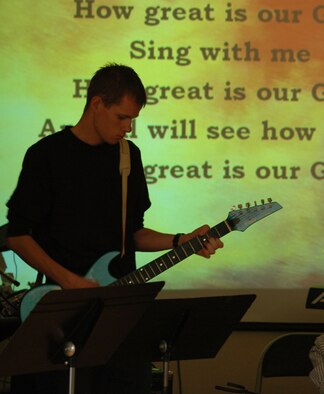 Airman Brad Turner, 341st Civil Engineer Squadron electrician apprentice, plays guitar during a contemporary worship service Nov. 4 at the Detour. The Sunday service started in October and begins at 10 a.m. (U.S. Air Force photo/Airman 1st Class Dillon White)
