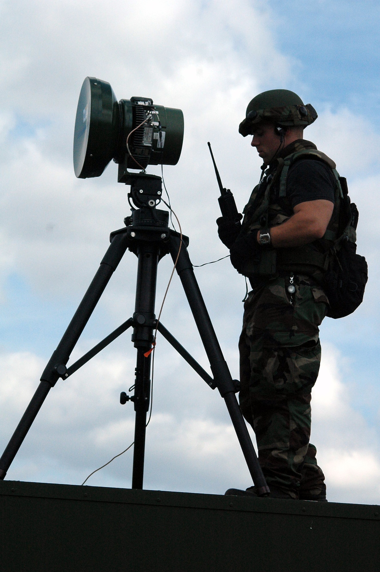 Second Lt. Neil Wood, from the 1st Combat Communications Squadron, Ramstein Air Base, Germany, works on setting up communications equipment in the air expeditionary group encampment for Air Force Exercise Eagle Flag 08-1 Oct. 23 at Naval Air Engineering Station Lakehurst, N.J.  Lieutenant Wood was one of more than 400 Airmen who deployed to the exercise to be tested and trained in expeditionary combat support skills.  The exercise is operated by the U.S. Air Force Expeditionary Center's 421st Combat Training Squadron. (U.S. Air Force Photo/Tech. Sgt. Scott T. Sturkol)