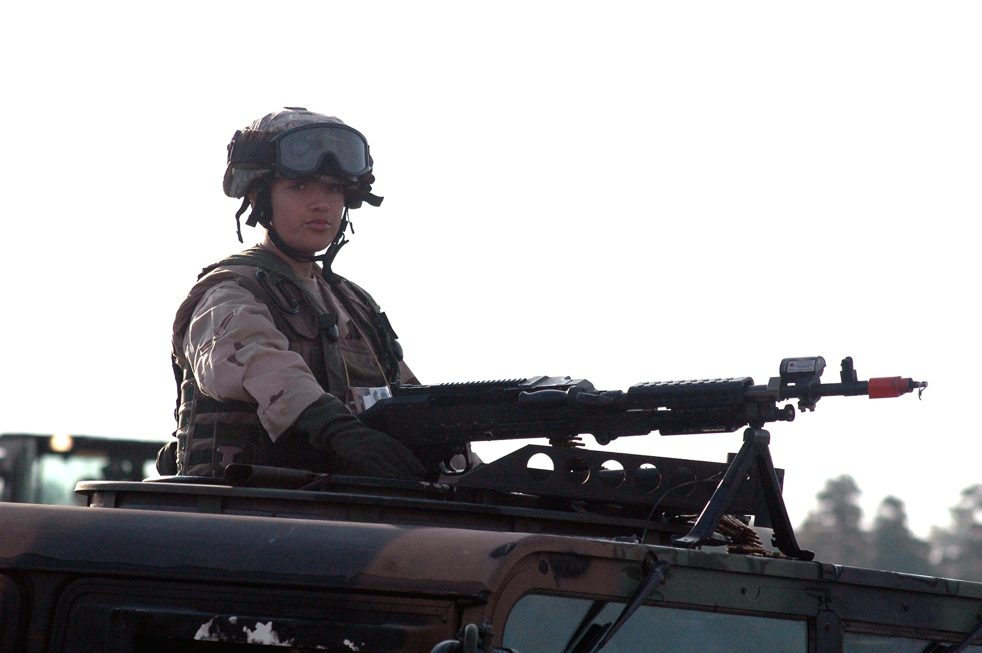 A student in Air Force Phoenix Warrior Training Course 08-1 prepares for a patrol around the air expeditionary group encampment for Air Force Exercise Eagle Flag 08-1 at Naval Air Engineering Station Lakehurst, N.J., Oct. 23.  Phoenix Warrior is a contingency skills training course for Air Force security forces prior to deployment.  The course and the exercise the students were participating in are operated by the U.S. Air Force Expeditionary Center's 421st Combat Training Squadron at Fort Dix, N.J.  (U.S. Air Force Photo by Tech. Sgt. Scott T. Sturkol)