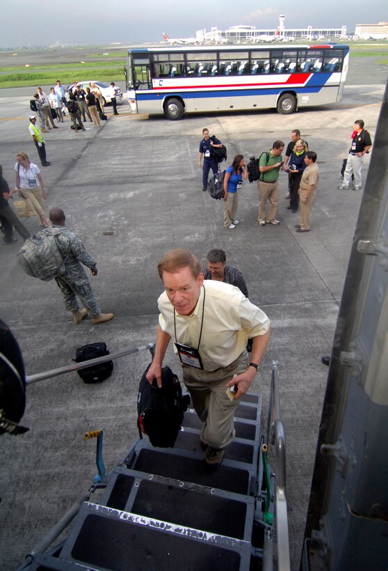 Bob R. McCluskey Jr., former state representative from Fort Collins, Colo., boards a U.S. Air Force C-17 Globemaster III at Manila International Airport enroute to Kadena Air Base in Okinawa, Japan, as part of the 74th Joint Civilian Orientation Conference, Nov. 9, 2007.