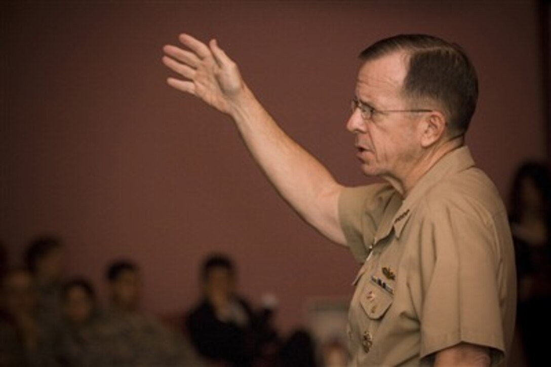 Chairman of the Joint Chiefs of Staff Adm. Mike Mullen, U.S. Navy, gestures as he answers a question from the audience during a town hall meeting with U.S. service members assigned to Camp Zama, Sagamihara, Japan, on Nov. 8, 2007.  