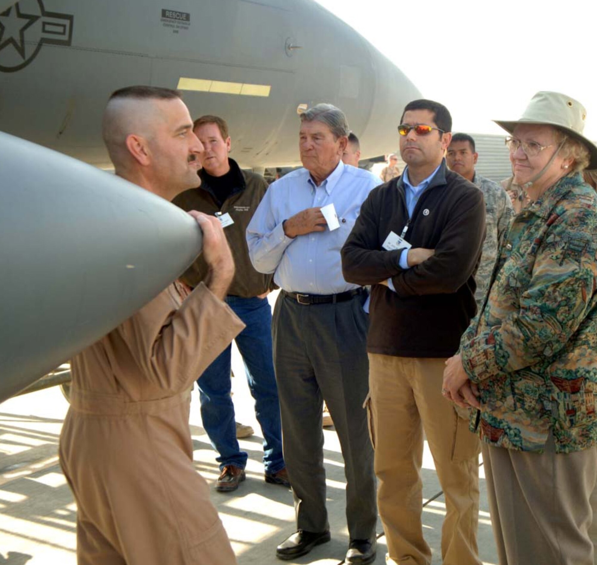 BAGRAM AIR BASE, Afghanistan -- Lt. Col. Eugene McFeely, commander of the 336th Expeditionary Fighter Squadron here, briefs a group of visiting civic leaders on the capabilities of the F-15E Strike Eagle on Nov. 9, 2007.  More than a dozen business and community leaders from across the United States accompanied Lt. Gen. Frank Klotz, the Air Force Assistant Vice Chief of Staff for a tour of the U.S. Central Command Air Forces Area of Responsibility.  The tour gave the civic leaders a first-hand exposure to the CENTAF mission and the Airmen who carry it out.  (U.S. Air Force Photo by Staff Sgt. Mike Andriacco)