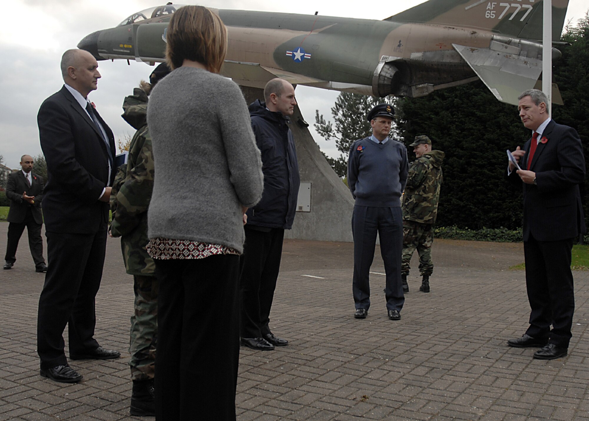 Students in their final week of the London Metropolitan Police Protection Course secure the area around Memorial Park at RAF Lakenheath, England Nov. 7 to train for protecting members of the Royal Family and foreign dignitaries.