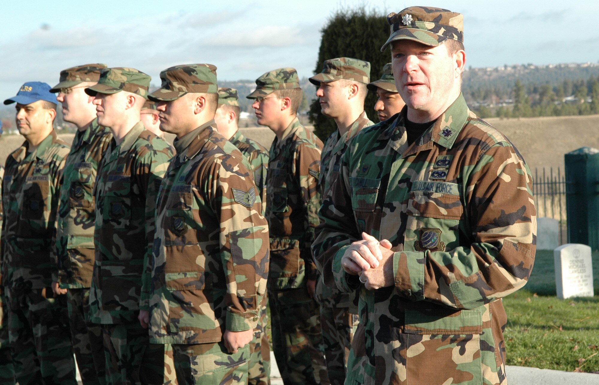 FAIRCHILD AIR FORCE BASE, Wash. -- Lt. Col. Seann Cahill, 92nd Logistics Readiness Squadron commander, gives a few words during a Veterans Day ceremony held Nov. 11 at the Fort Wright Cemetery.  During his remarks, Colonel Cahill spoke about the importance of the veterans that stay at home, the families of our deployed service members. (U.S. Air Force photo / Tech. Sgt. Larry W. Carpenter Jr.)