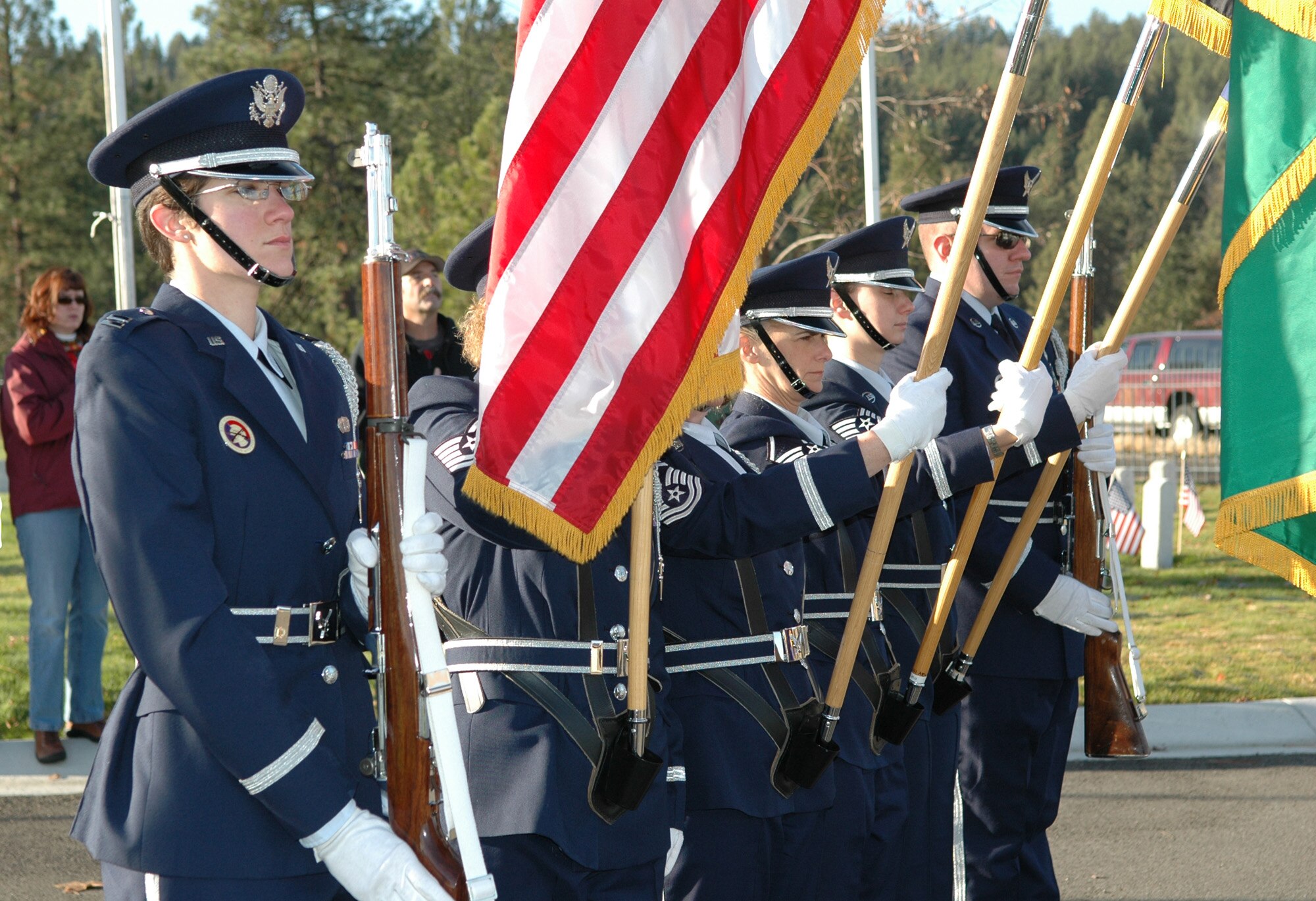 FAIRCHILD AIR FORCE BASE, Wash. -- The Washington Air National Guard Color Guard post the colors during a Veterans Day ceremony held Nov. 11 at the Fort Wright Cemetery. The cemetery was authorized by the Secretary of War in 1899 and today contains the remains of more than 650 veterans and their families. (U.S. Air Force photo / Tech. Sgt. Larry W. Carpenter Jr.)