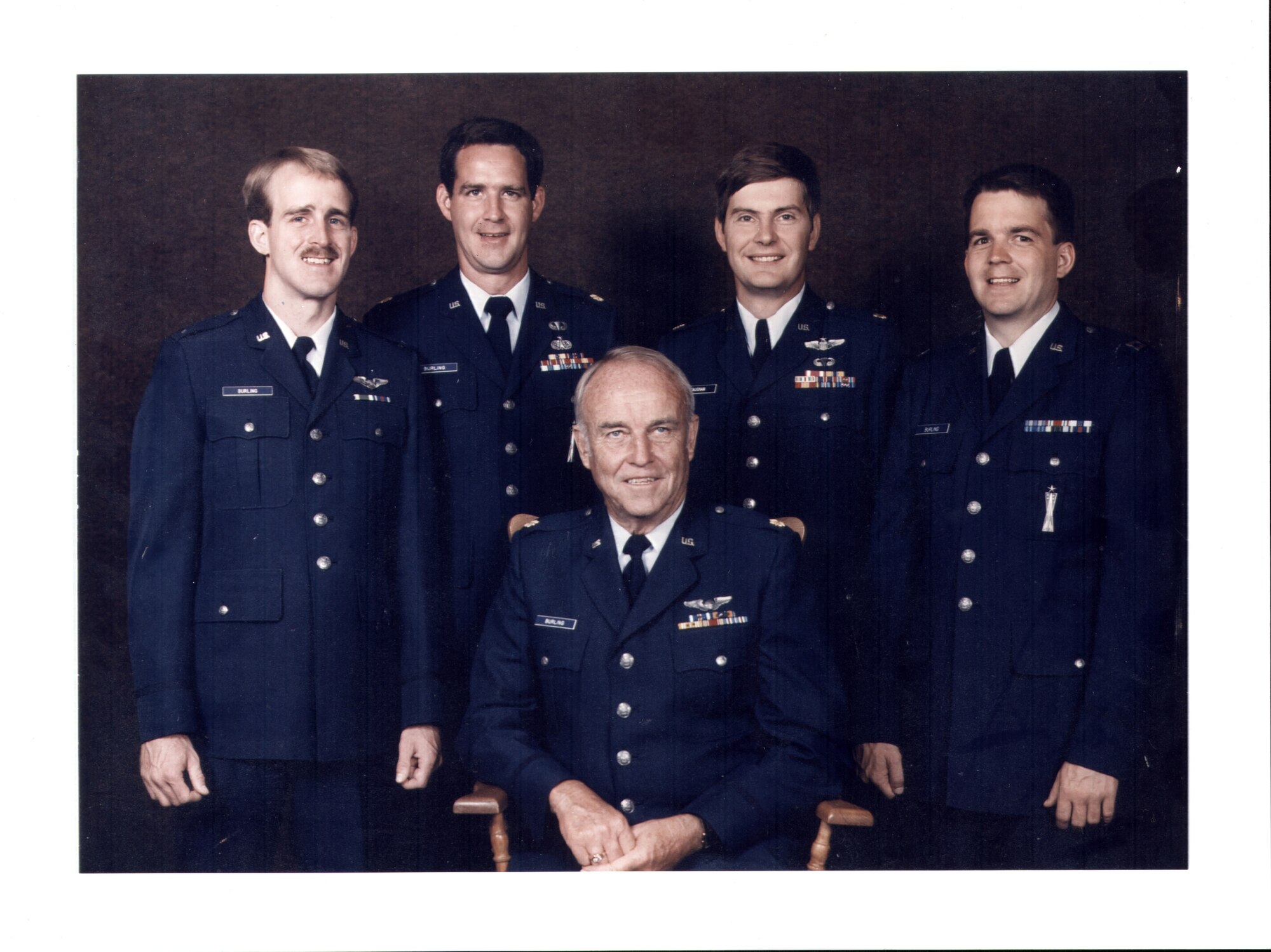 Air Force life was the standard in the Burling family, who combined served 126 years. Retired Col. Jim Burling Sr. (seated), started the trend and was later followed by (standing left to right) Steve Burling, his youngest son, Jim Burling Jr., his oldest son, John Gaughan, his son-in-law, and John Burling, his middle son. Steve, a former MC-130H navigator for the 15th Special Operations Squadron at Hurlburt Field, retired Oct. 1. (Courtesy photo)
