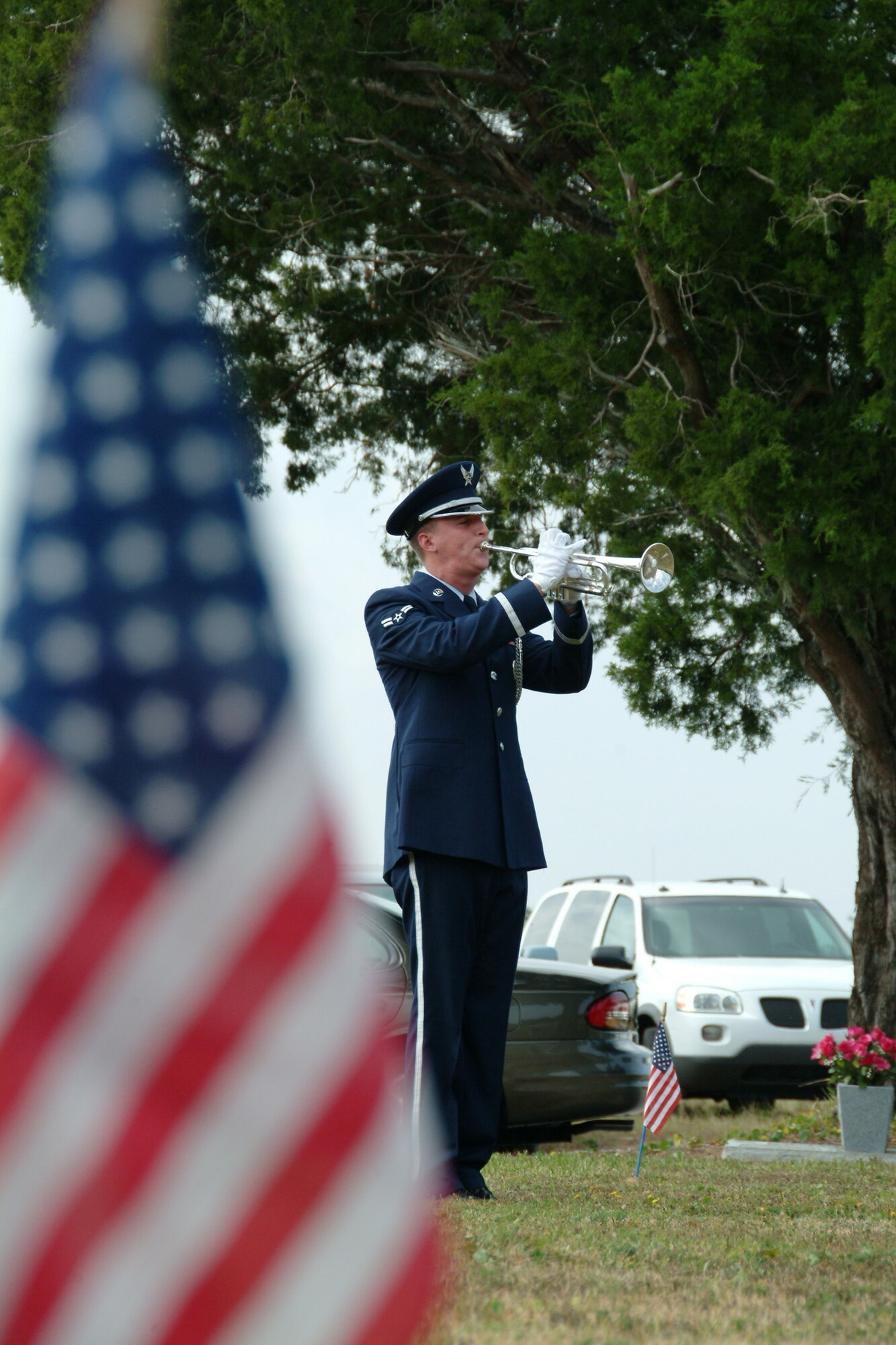Airman 1st Class Ronald Sowell, Eglin Air Force Base Honor Guard, play taps at the Beal Memorial Cemetery Veterans Day ceremony Nov. 12 in Fort Walton Beach, Fla.  Col. Ken Wilsbach, 53d Wing commander, was the guest speaker. The event was concluded with a 21-gun salute by the Eglin Honor Guard and an F-16 missing man formation fly-over by the 85th Test and Evaluation Squadron. Airman Sowell is from the 33rd Aircraft Maintenance Squadron. (U.S. Air Force photo/ Tech. Sgt. Andrew Leonhard)