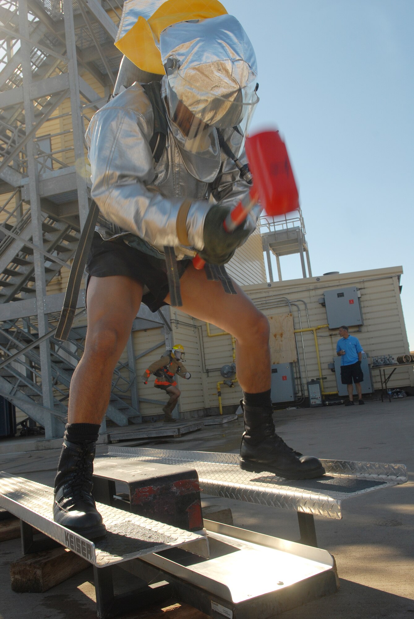 A member of the Air Force Alpha team swings a sledge hammer during the Rookie Challenge Oct. 20. (U.S. Air Force photo by Airman 1st Class Kamaile Chan)