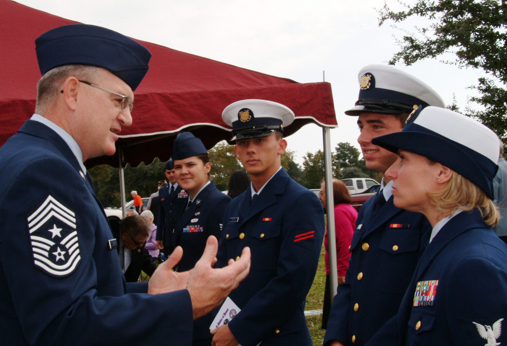 Chief Master Sgt. Randy Salefske, 53d Wing command chief, spoke to U.S. Coast Guard and Air Force members prior to the Beal Memorial Cemetery Veterans Day ceremony Nov. 12. Nearly 300 people paid respects at the memorial in Fort Walton Beach, Fla. (U.S. Air Force photo/ Tech. Sgt. Andrew Leonhard)