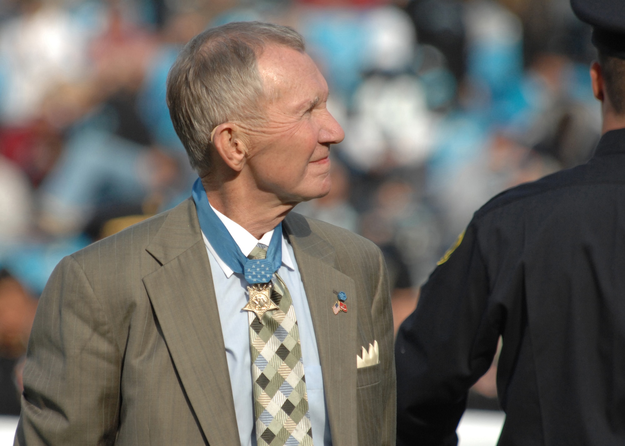 CHARLOTTE, N.C. -- Congressional Medal of Honor awardee, Marine Maj. Gen. (ret) Jim Livingston, is recognized Nov. 11 prior to the Carolina Panters/Atlanta Falcons game in Charlotte, N.C. in honor of Veterans Day. (U.S. Air Force photo/Staff Sgt. Henry Hoegen)