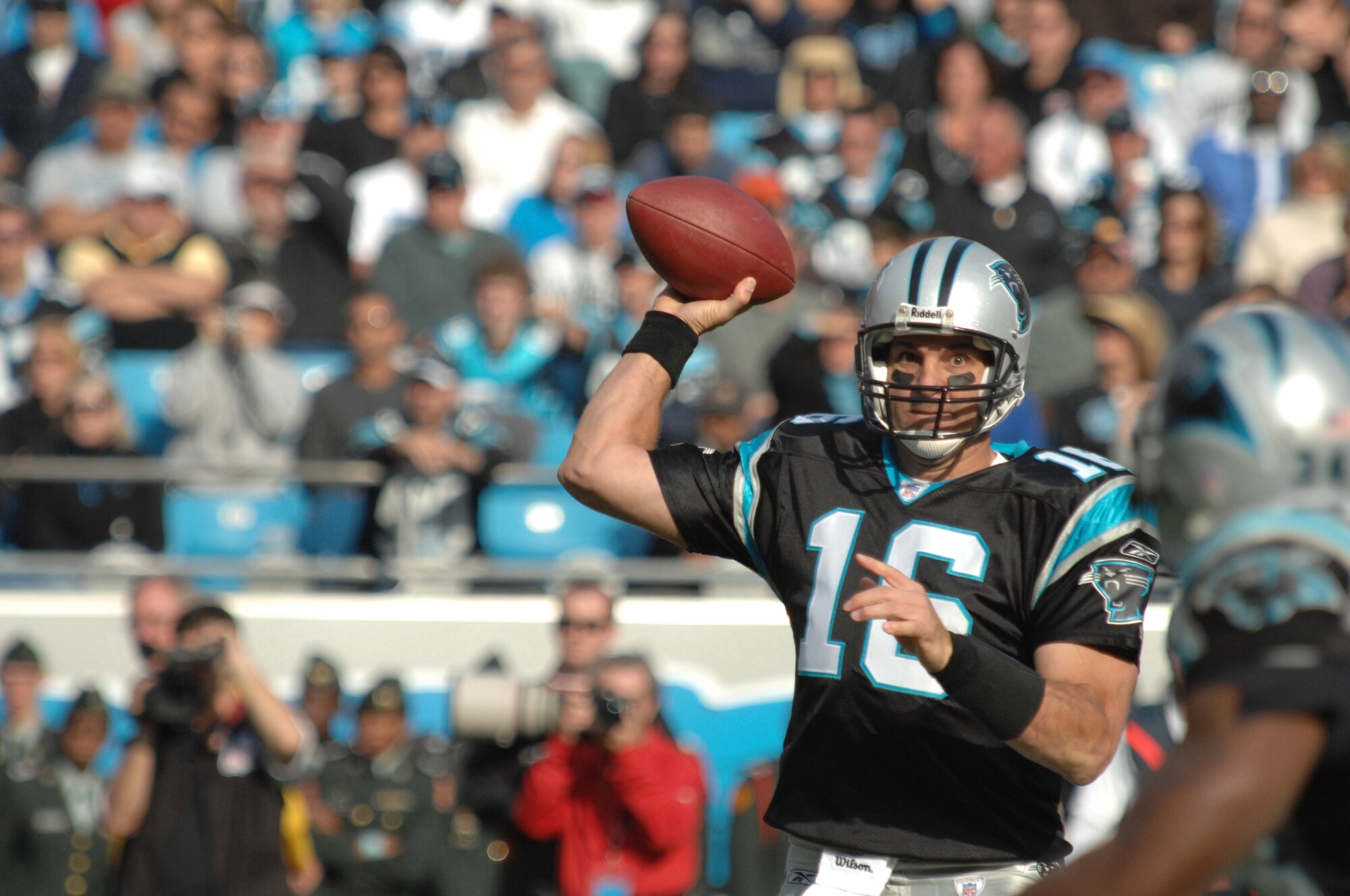 CHARLOTTE, N.C. -- Carolina Panthers quarterback, Vinny Testaverde, attempts a pass Nov. 11 against the Atlanta Falcons. Tesaverde took time after the game to reflect on what being led onto the field by wounded veterans meant to him.
"For me it's always special. Just knowing what they're doing for us ... giving us the privilege of going out and playing the game we love so much," Testaverde said. "Without the military, we wouldn't be able to do that. I'm very thankful for them."
(U.S. Air Force photo/Staff Sgt. Henry Hoegen)