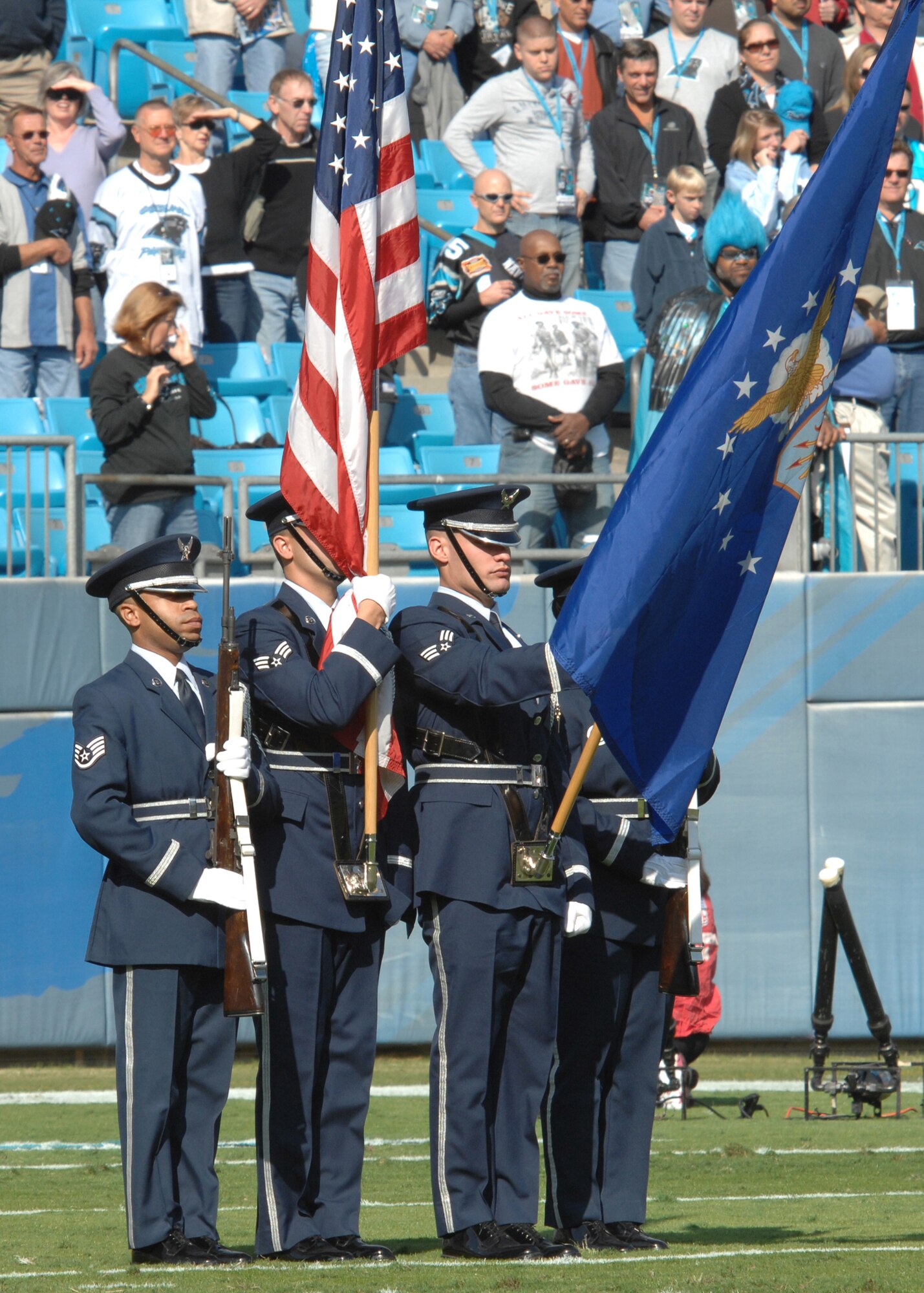 CHARLOTTE, N.C. -- The honor guard from Pope Air Force Base, N.C., represents the Air Force during the national anthem Nov 11. Each branch of service was represented during the Veterans Day pre-game fesivities. (U.S. Air Force photo/Staff Sgt. Henry Hoegen)