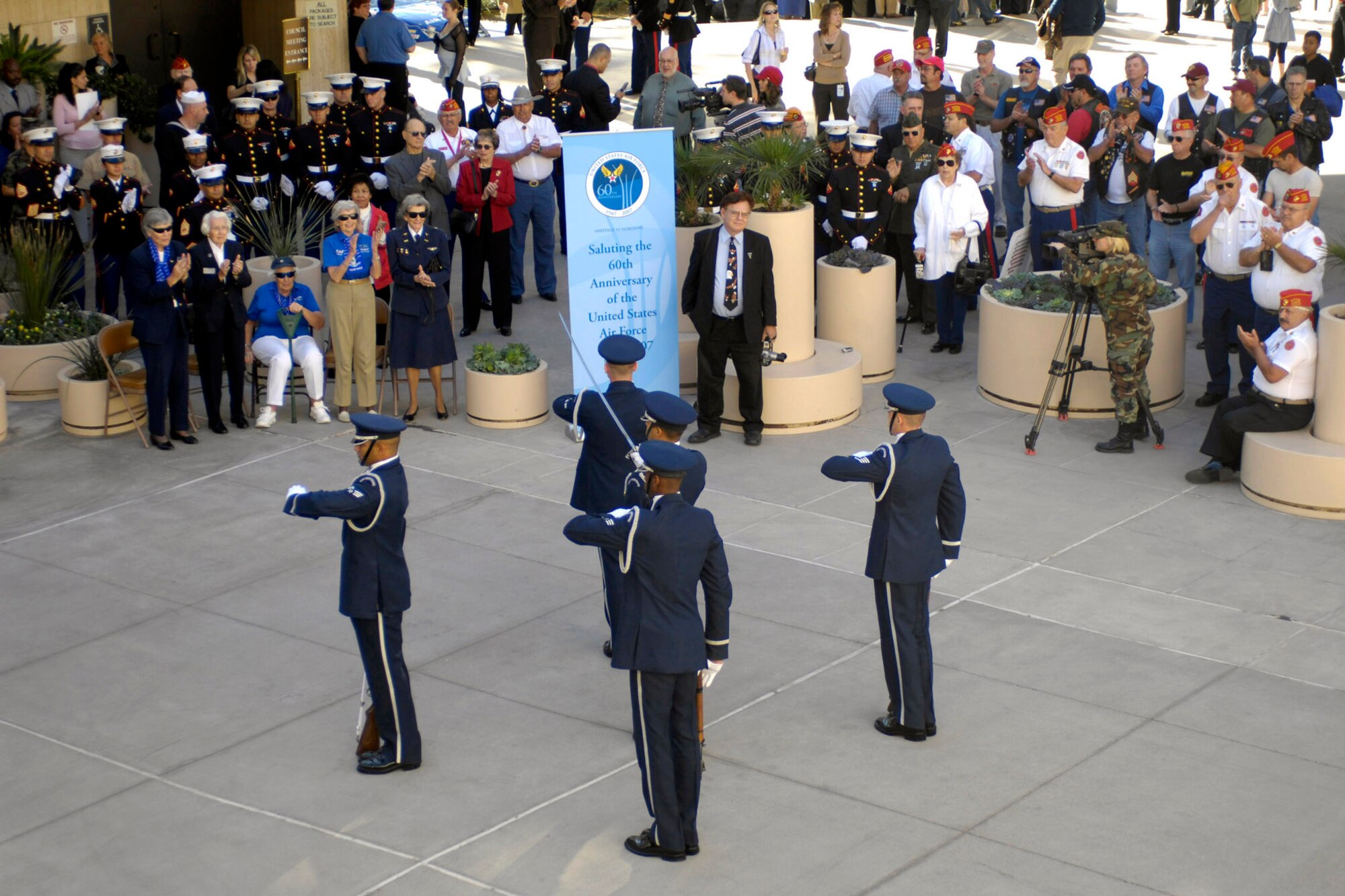 Members of the Air Force Honor Guard provide a rifle drill performance for a crowd outside of the city council chambers Nov. 8 in Las Vegas. Las Vegas Mayor Oscar Goodman held a special council meeting to proclaim Nov. 5 through 11 as Air Force Week in Las Vegas. (U.S. Air Force photo/Staff Sgt. Kenny Kennemer)
