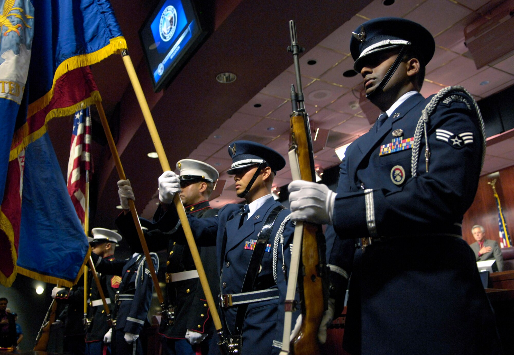A joint color guard present the colors at a city council meeting Nov. 7 in Las Vegas. The special meeting was used to honor the Marine Corps' 232nd birthday and also to present the Air Force with a certificate recognizing the week of Nov. 5 through 11 as Air Force Week in Las Vegas. (U.S. Air Force photo/Staff Sgt. Kenny Kennemer)
