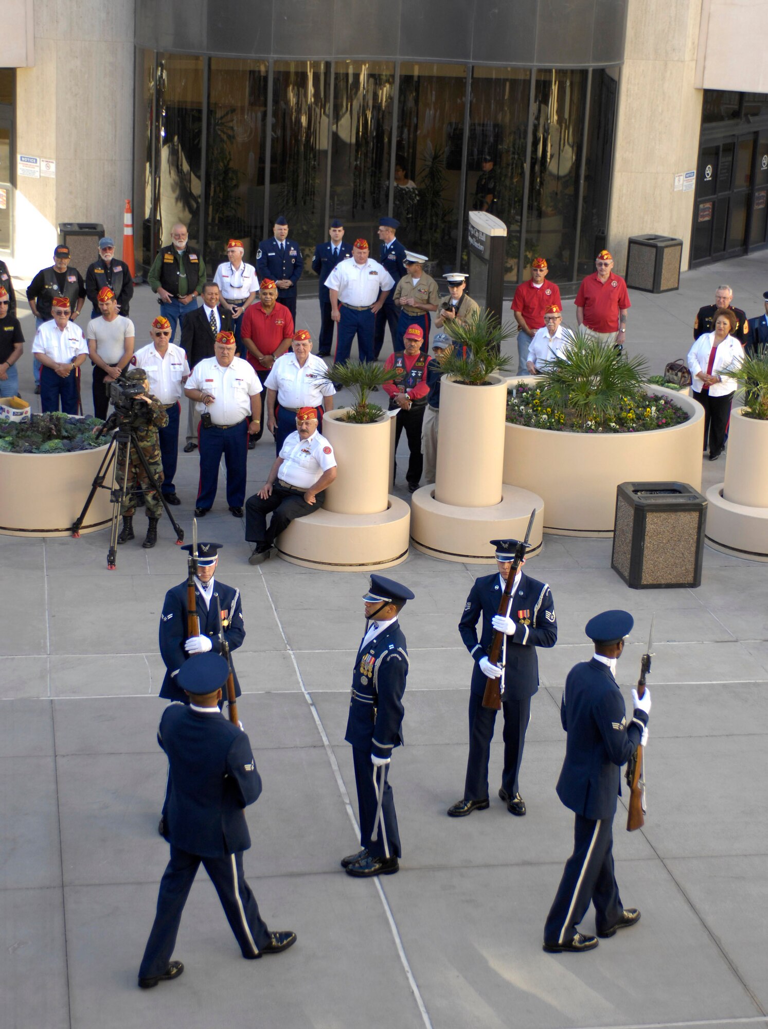 Members of the Air Force Honor Guard provide a rifle drill performance for a crowd outside of the city council chambers Nov. 8 in Las Vegas. Las Vegas Mayor Oscar Goodman held a special council meeting to proclaim Nov. 5 through 11 as Air Force Week in Las Vegas. (U.S. Air Force photo/Staff Sgt. Kenny Kennemer)
