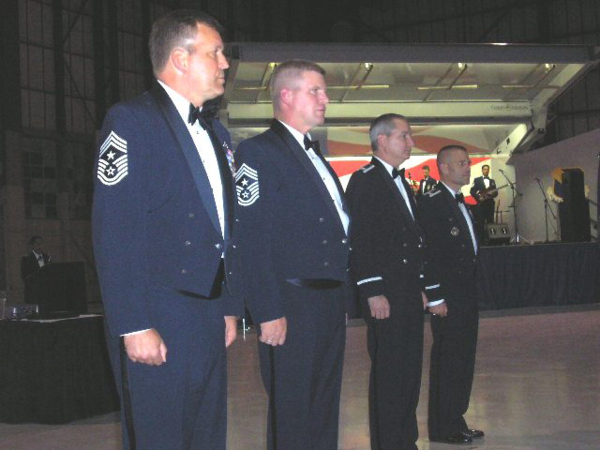 SEYMOUR JOHNSON AIR FORCE BASE, N.C. -- Leadership from the 916th Air Refueling Wing and the 4th Fighter Wing celebrate the Air Force's 60th birthday during the base's annual Air Force Ball on Nov. 3, 2007. From left to right are: Command Chief Master Sgt. Lester Boltinhouse, Command Chief Master Sgt. Harold Clark, Col. Fritz Linsenmeyer and Col. Steven Kwast. The event was held in the 916th Air Refueling Wing's hangar.