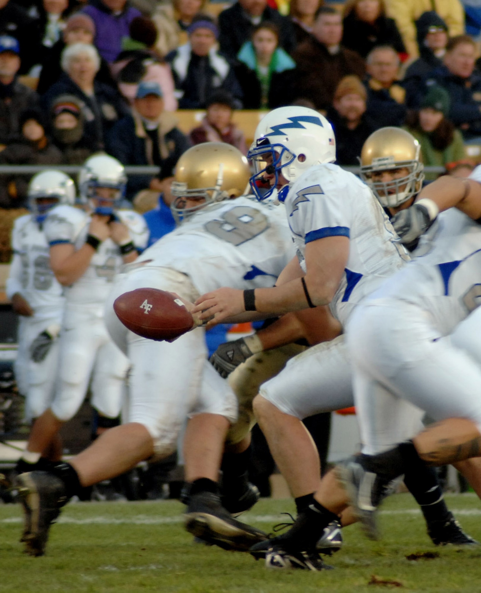 U.S. Air Force Academy Falcons quarterback Shaun Carney looks to hand off the ball in the Falcons' 41-24 victory over Notre Dame Nov. 10 at Notre Dame Stadium in Indiana. (Courtesy photo by Vanessa Gempis) 
