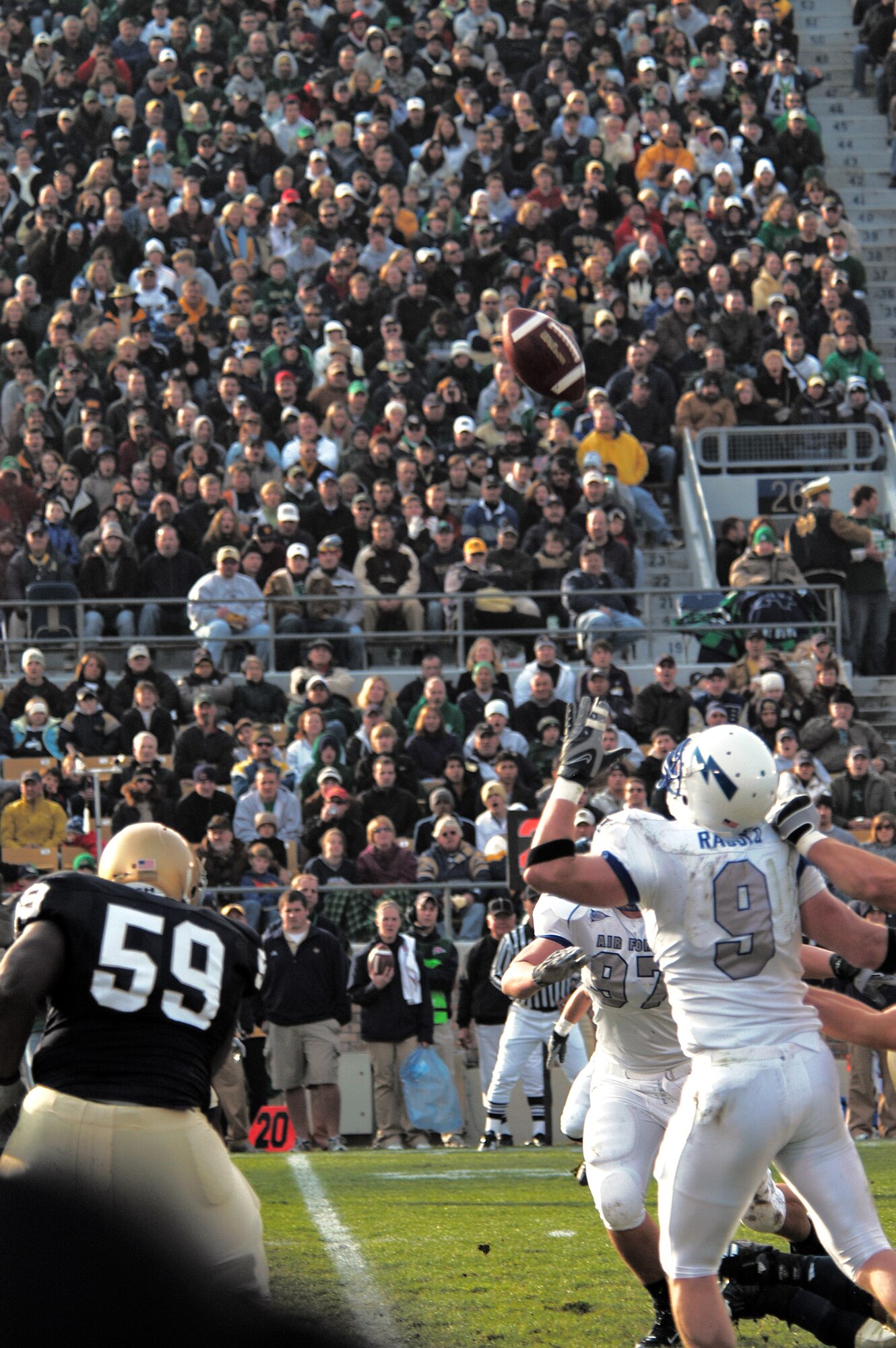 U.S. Air Force Academy Falcon outside linebacker John Rabold, 9, zeroes in a popped up fumble in the first quarter of Air Force's 41-24 victory over the Fighting Irish Nov. 10 at Notre Dame Stadium in Indiana. Rabold recovered the turnover and ran 19 yards for the Falcons' first touchdown. (U.S. Air Force photo/Staff Sgt. Monte Volk) 
