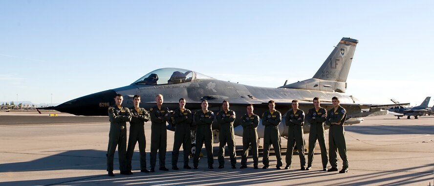 The 61st Fighter Squadron class 07-FBC graduates 11 student pilots today. They are, from left, 1st Ryan Cross, 1st Lt. Josh Carter, 1st Lt. Neil Gorham, 1st Lt. Jonathan  Gilbert, Capt. Chris Guarente, Capt. Dave Antonio, Capt. Kris Deuel, Capt. Chad Sebero, 1st Lt. Matt Crabb, 2nd Lt. Chris Bachelor and Capt. Tyler Robarge.