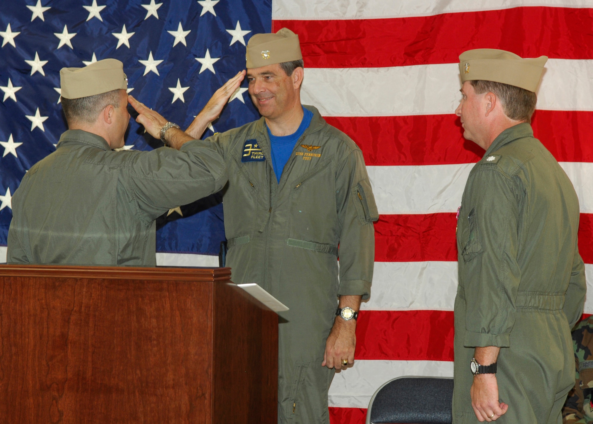Navy Captain Russell Penniman presides over the Navy change of command Nov. 9 as Commander Charles DeGilio assumes command from Commander Andrew Jones, at the Third Fleet Detachment here. The Third Fleet is a reserve unit that works out of 12th AF. (U.S. Air Force photo by Senior Airman Jesse Shipps)