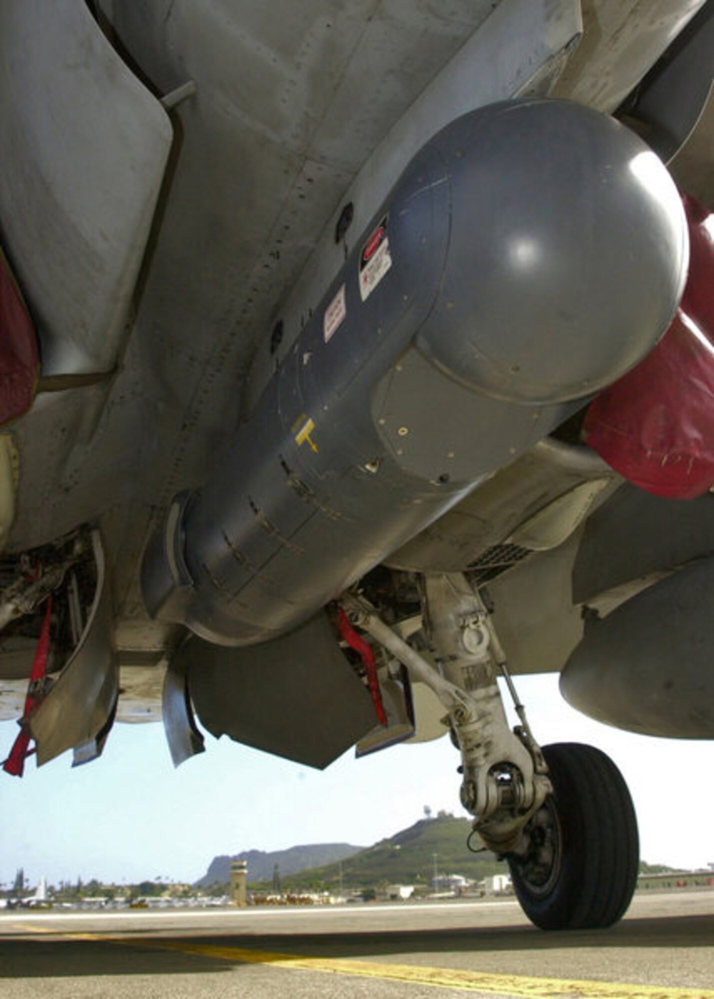 A camera located on a Litening Targeting Pod, shown here attached to an F/A-18 aircraft, works by receiving energy pulses from a targeted object as part of the Laser Target Imaging Program. LTIP, one of two 630th Electronic Systems Squadron's combat ID technologies showcased at Bold Quest,  provides strike aircraft with real-time ID capability by illuminating targets at a much farther range than previously existed.  (Courtesy photo)